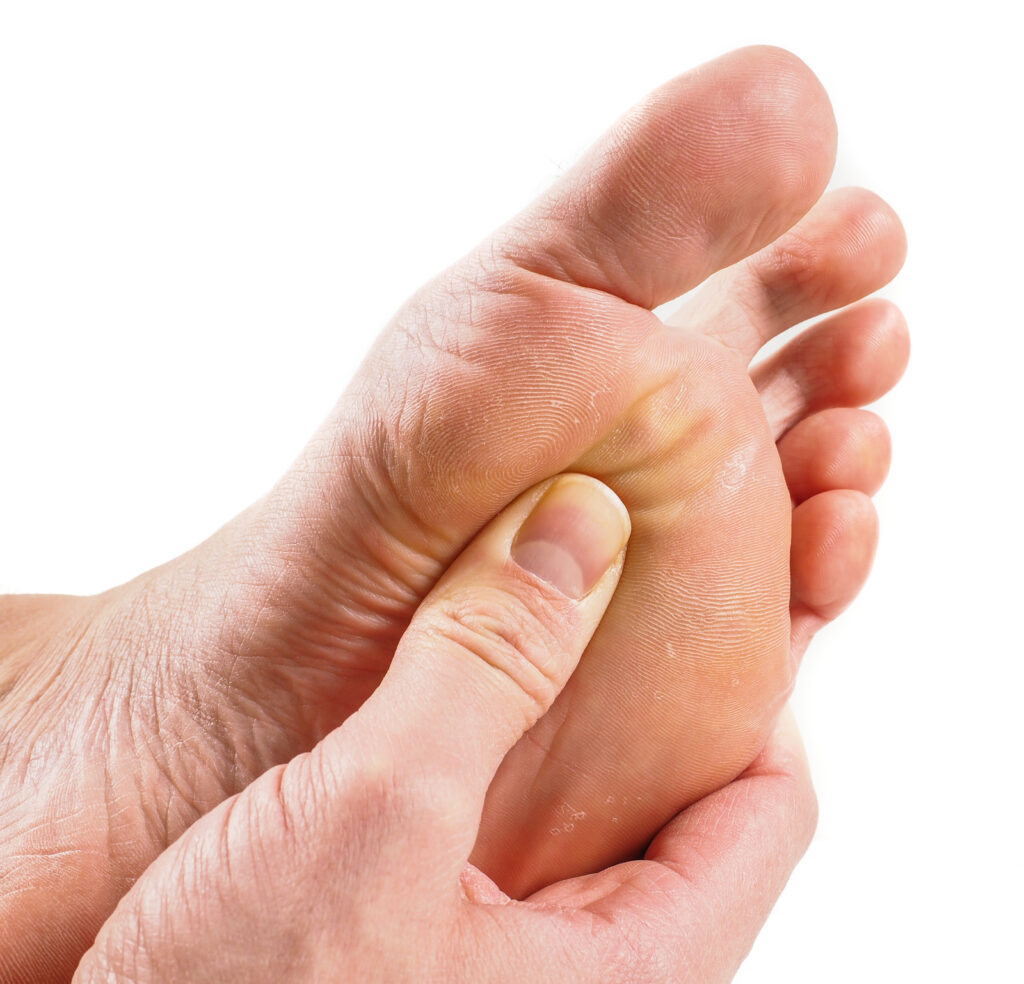 Male Person Receiving Podiatry With Pressure Point Technique
